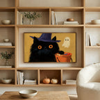 Black cat in a witch hat art on a TV in built-in oak shelves with pumpkins and books