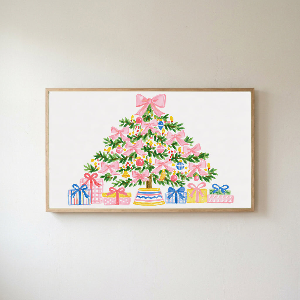 Frame TV art of a pink bow Christmas tree with gifts in a light wood frame on a warm white wall