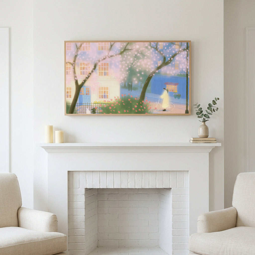 Cherry blossom street art above a white fireplace with candles and eucalyptus on the mantel