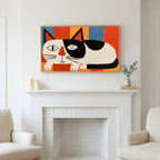 Frame TV art above a white fireplace with candles and eucalyptus on the mantel