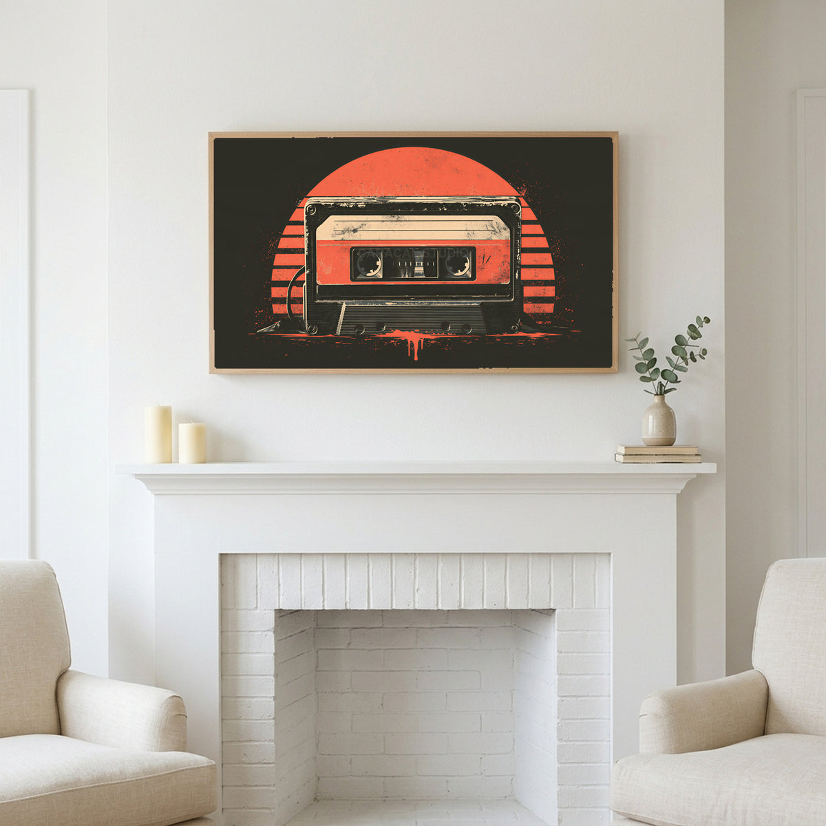 Retro cassette tape art above a white fireplace with candles and eucalyptus on the mantel