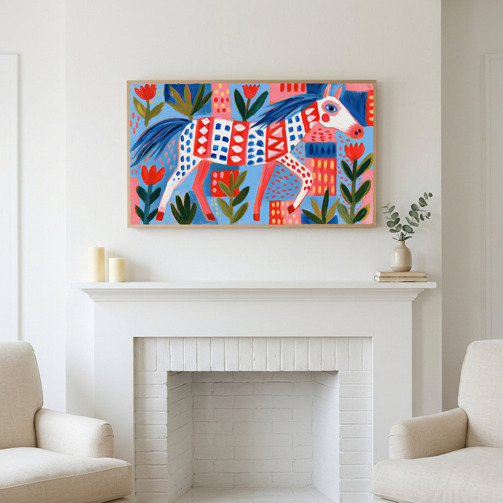 Frame TV art above a white fireplace with candles and eucalyptus on the mantel