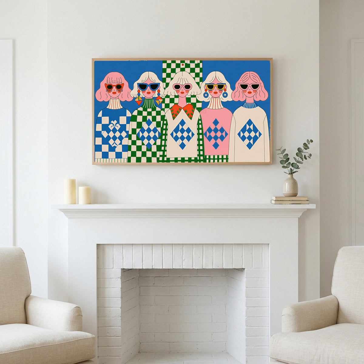 Retro women in sunglasses art above a white fireplace with candles and eucalyptus on the mantel