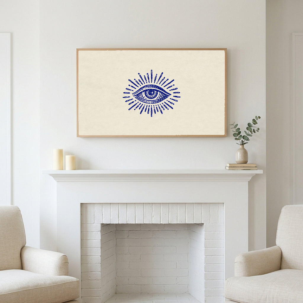 Mystic eye art above a white fireplace with candles and eucalyptus on the mantel