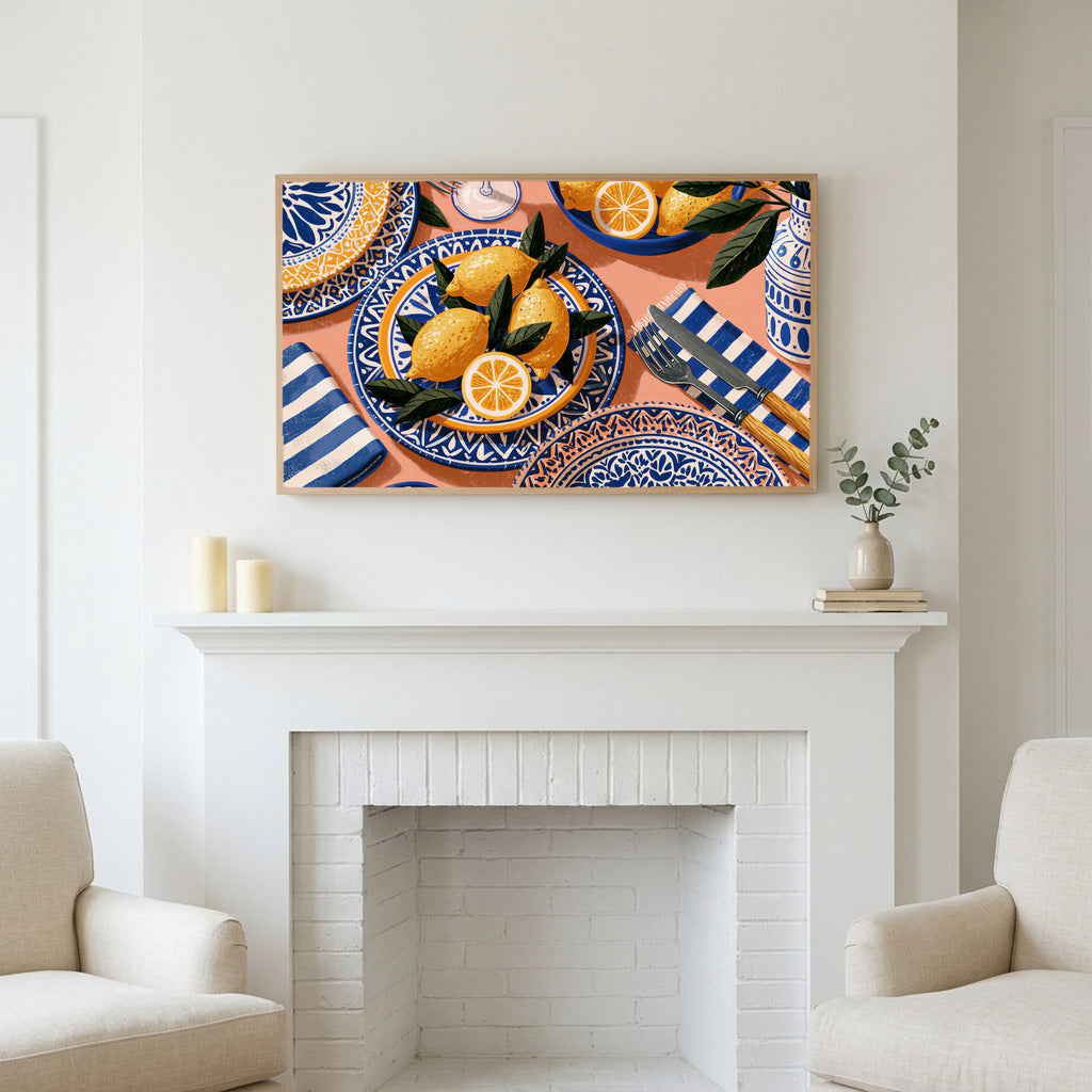Mediterranean lemons art above a white fireplace with candles and eucalyptus on the mantel