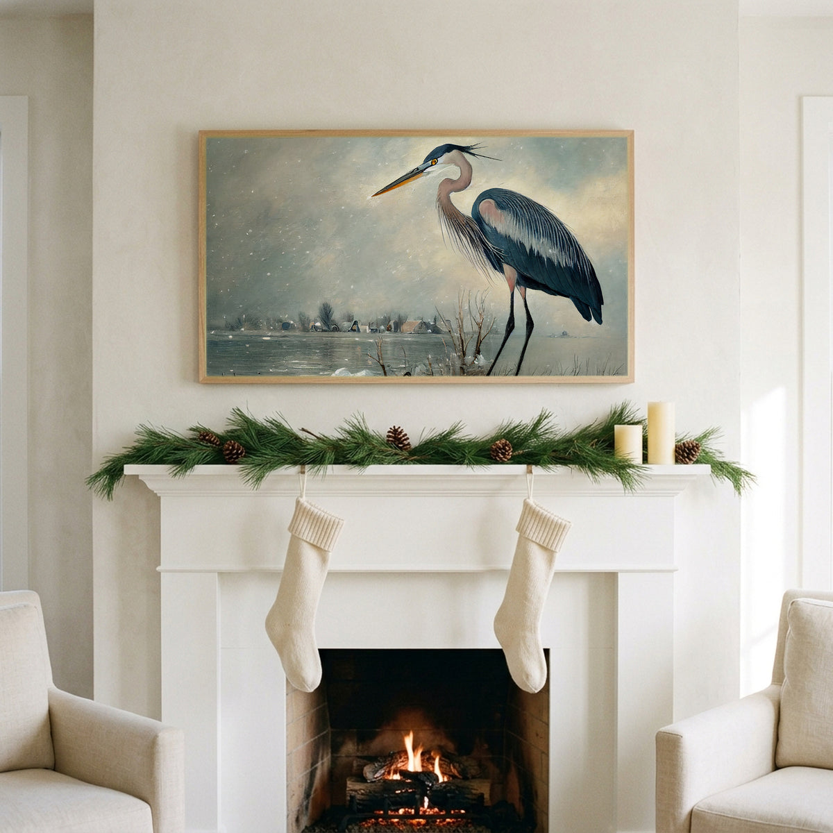 Blue heron art on a TV above a white fireplace with a pine garland and cream stockings