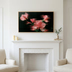 Ribbed glass flowers art above a white fireplace with candles and eucalyptus on the mantel