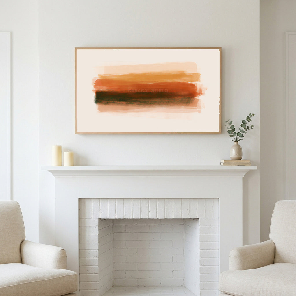 Terracotta brushstroke art above a white fireplace with candles and eucalyptus on the mantel