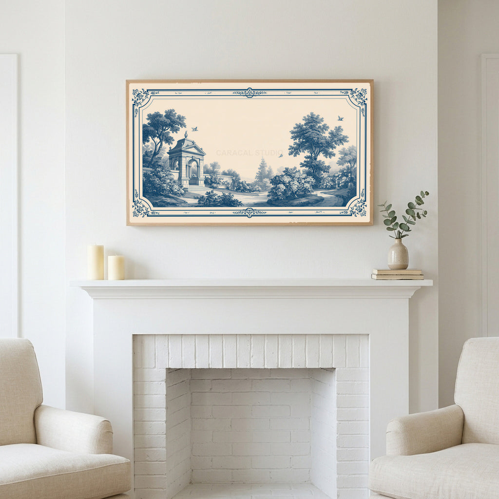 Blue toile garden art above a white fireplace with candles and eucalyptus on the mantel
