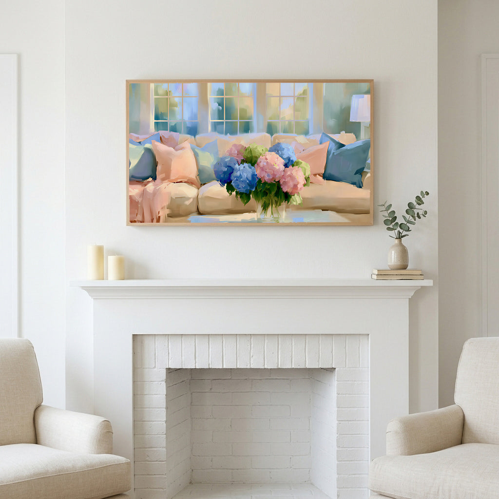 Pastel hydrangea bouquet art above a white fireplace with candles and eucalyptus on the mantel