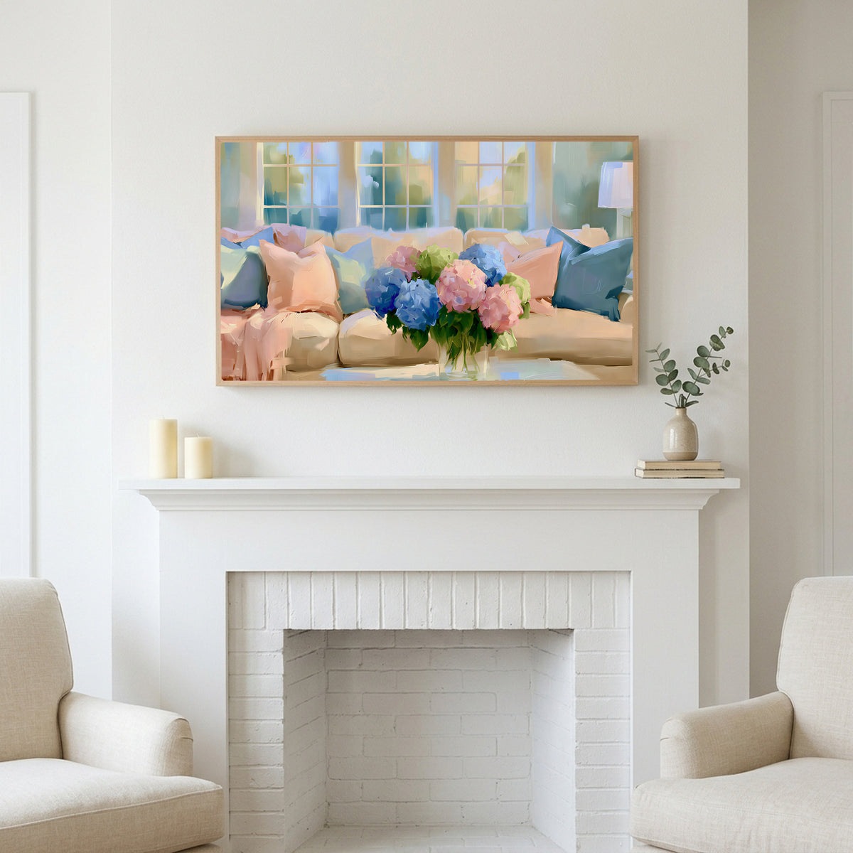 Pastel hydrangea bouquet art above a white fireplace with candles and eucalyptus on the mantel