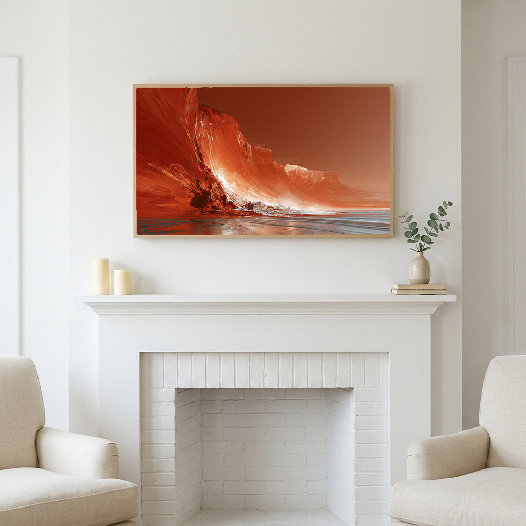 Red sea cliffs art above a white fireplace with candles and eucalyptus on the mantel