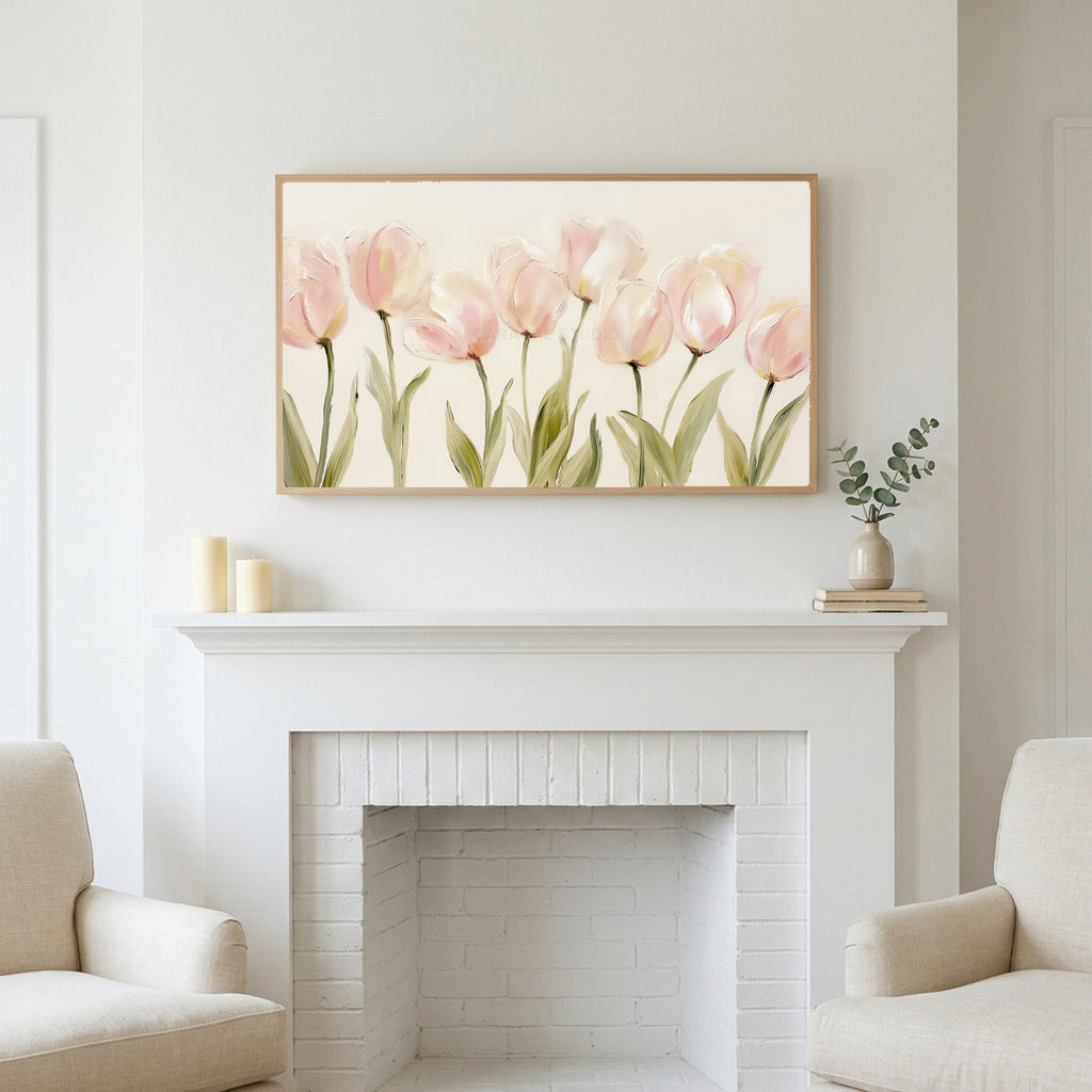 Frame TV art above a white fireplace with candles and eucalyptus on the mantel