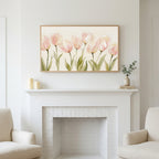 Frame TV art above a white fireplace with candles and eucalyptus on the mantel
