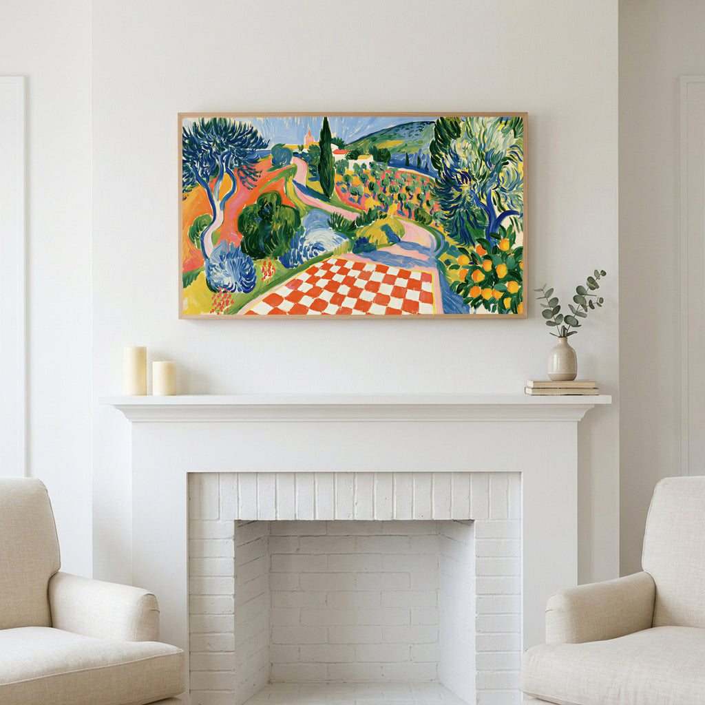 Italian countryside art above a white fireplace with candles and eucalyptus on the mantel