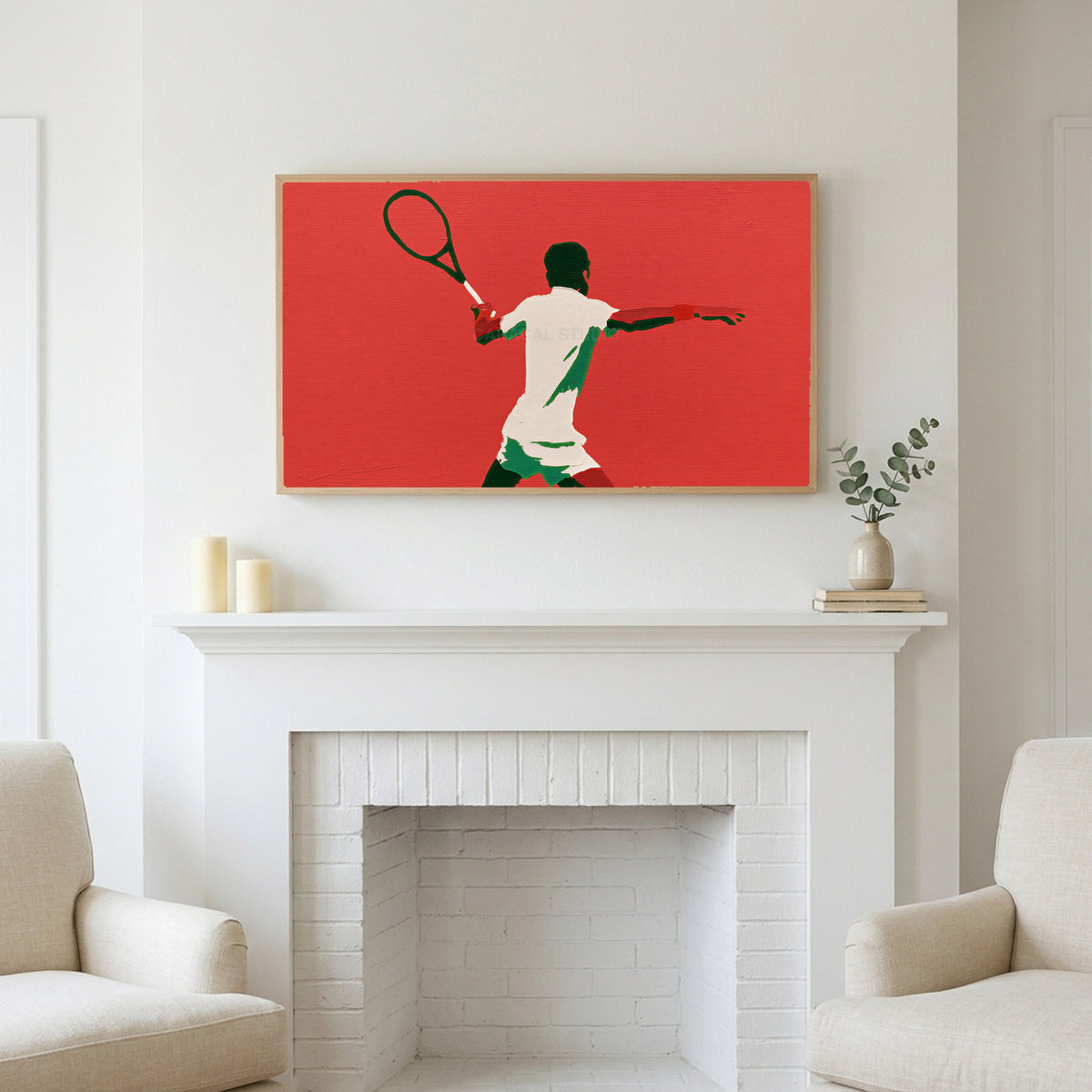 Frame TV art above a white fireplace with candles and eucalyptus on the mantel