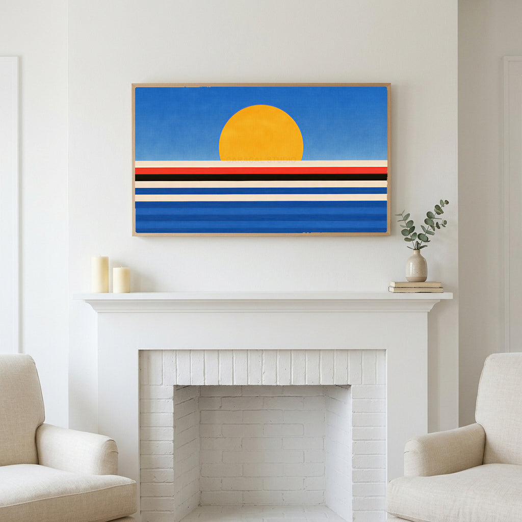 Retro sunset over the sea art above a white fireplace with candles and eucalyptus on the mantel