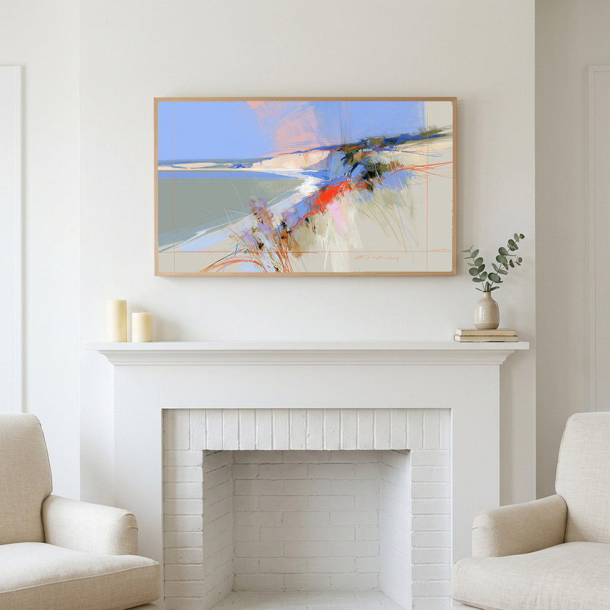 Abstract chalk cliffs art above a white fireplace with candles and eucalyptus on the mantel