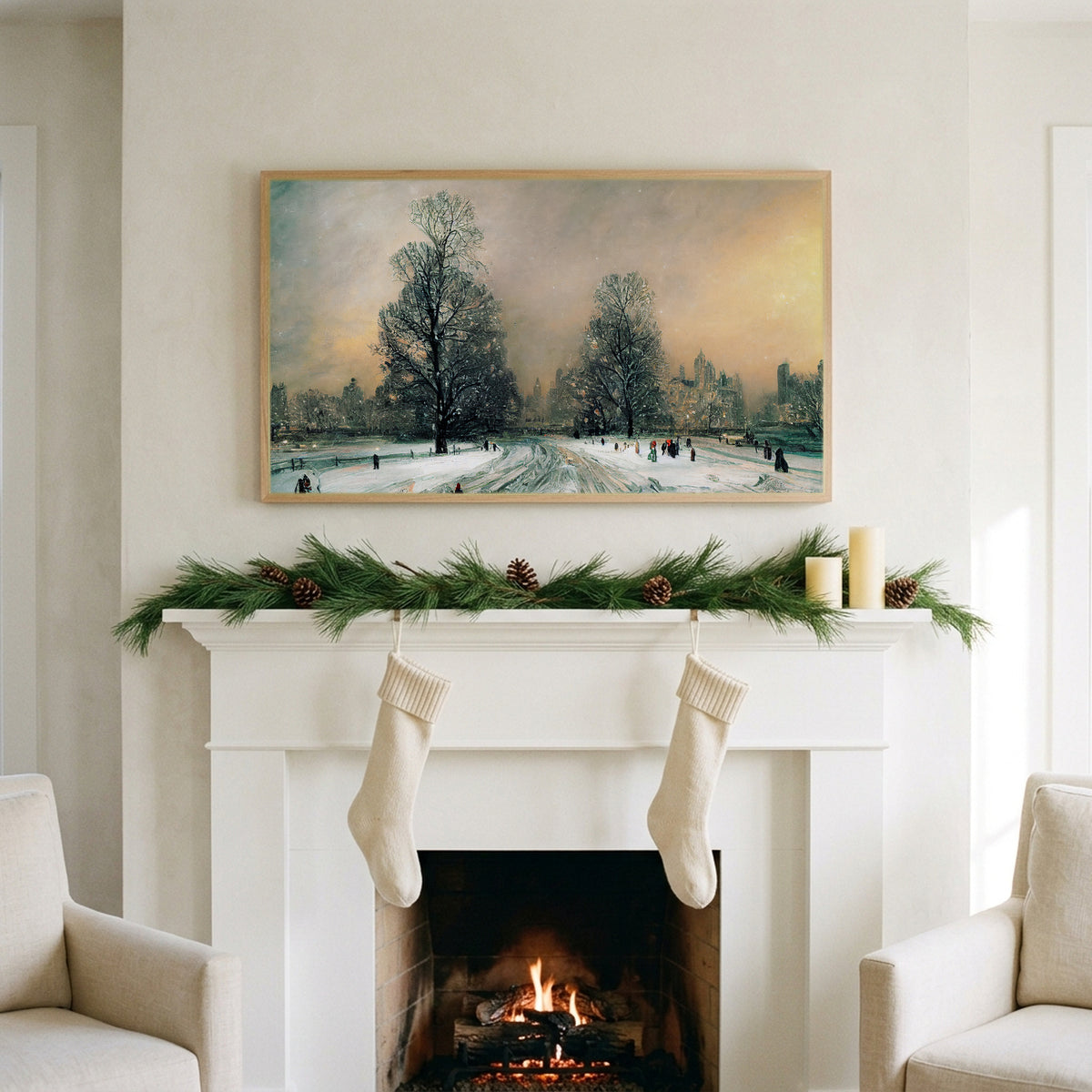 Snowy New York park art on a TV above a white fireplace with a pine garland and cream stockings