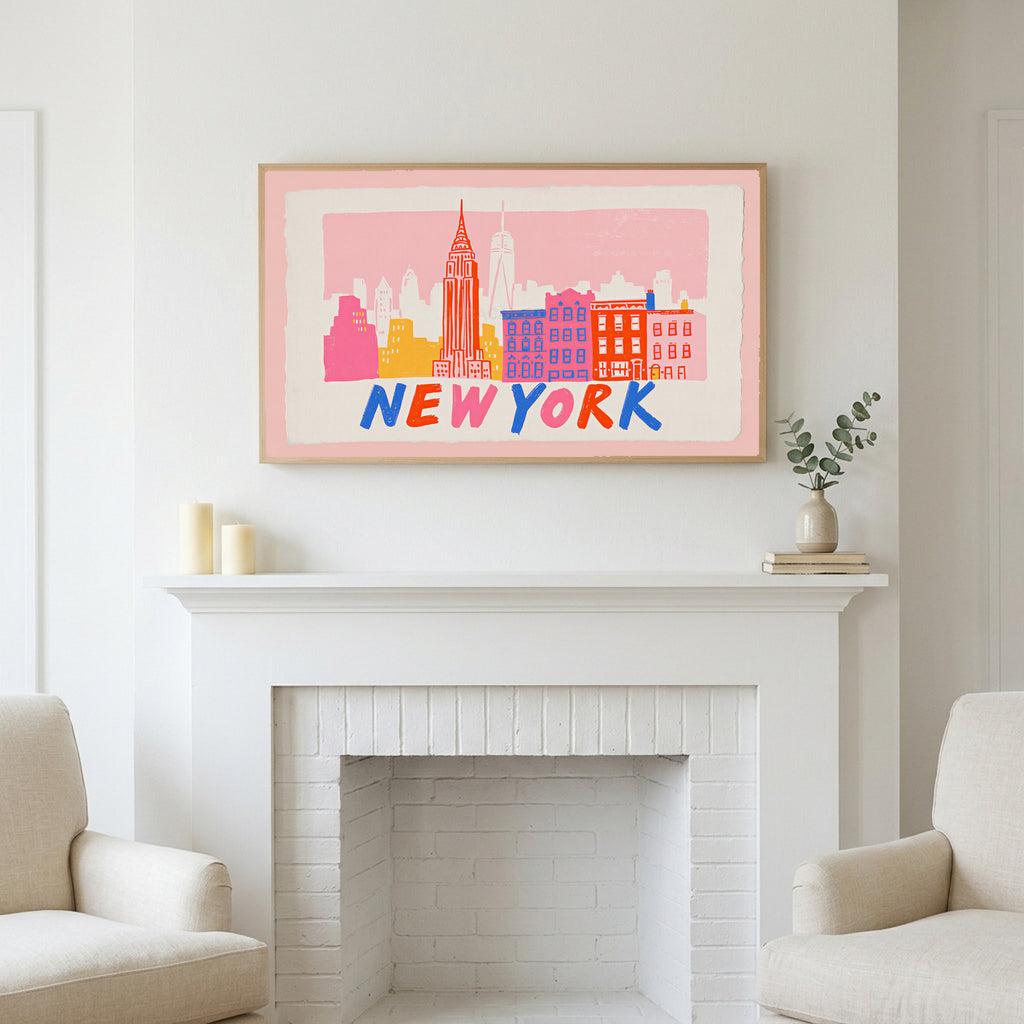 New York skyline art above a white fireplace with candles and eucalyptus on the mantel