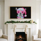 Llama in a Santa hat art on a TV above a white fireplace with a pine garland and cream stockings