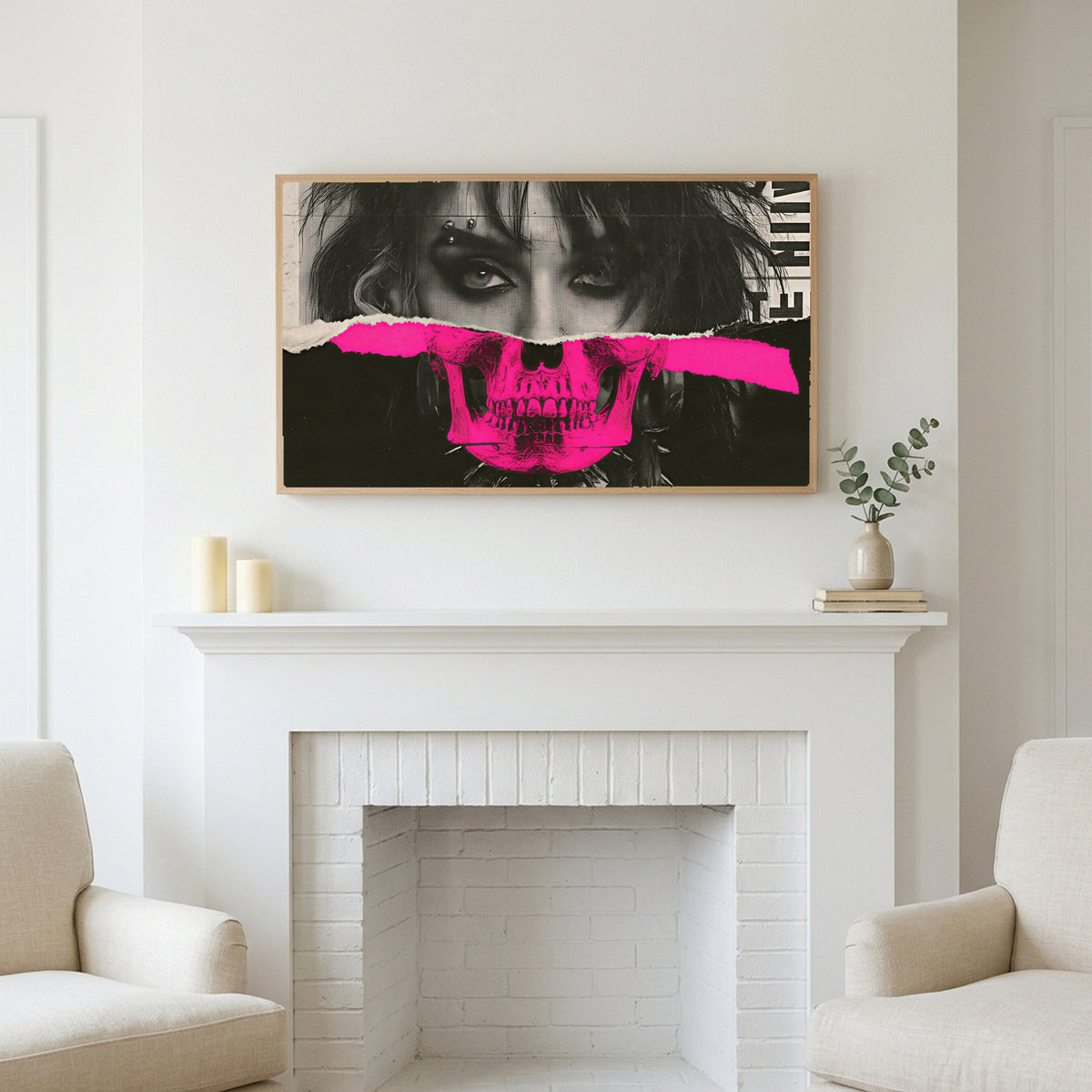 Punk skull portrait art above a white fireplace with candles and eucalyptus on the mantel