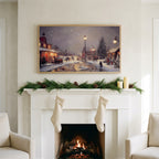 Snowy village at night art on a TV above a white fireplace with a pine garland and cream stockings
