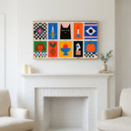 Mid century grid art above a white fireplace with candles and eucalyptus on the mantel