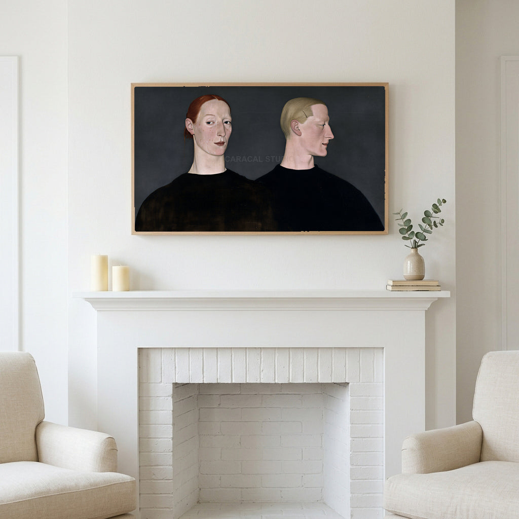 Two women portrait art above a white fireplace with candles and eucalyptus on the mantel
