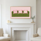 Green sofa art above a white fireplace with candles and eucalyptus on the mantel