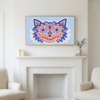 Frame TV art above a white fireplace with candles and eucalyptus on the mantel