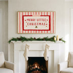 Merry Little Christmas art on a TV above a white fireplace with a pine garland and cream stockings