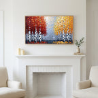 Autumn birch trees art above a white fireplace with candles and eucalyptus on the mantel