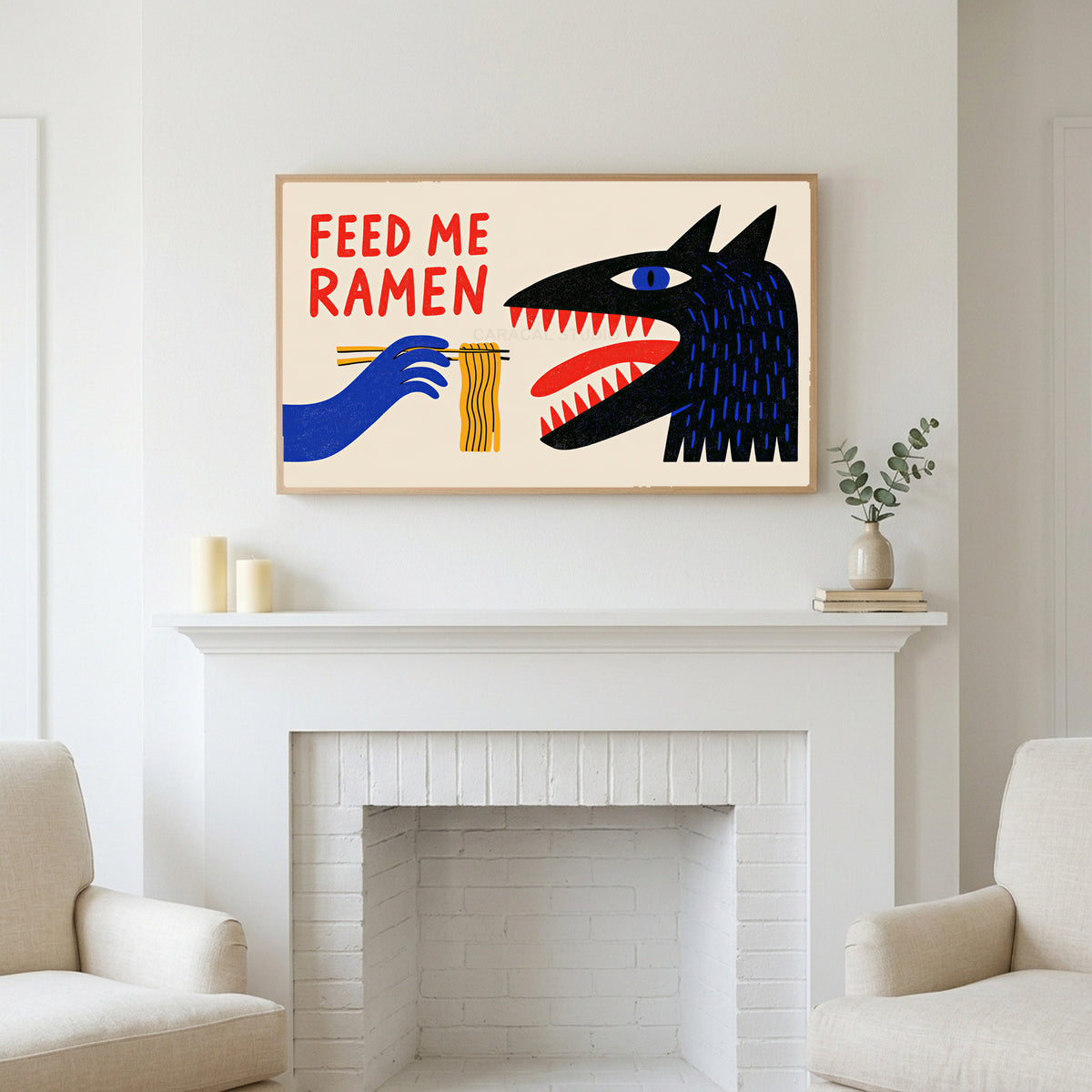 Feed Me Ramen art above a white fireplace with candles and eucalyptus on the mantel