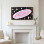 Frame TV art above a white fireplace with candles and eucalyptus on the mantel