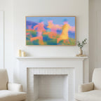 Blurred meadow runners art above a white fireplace with candles and eucalyptus on the mantel