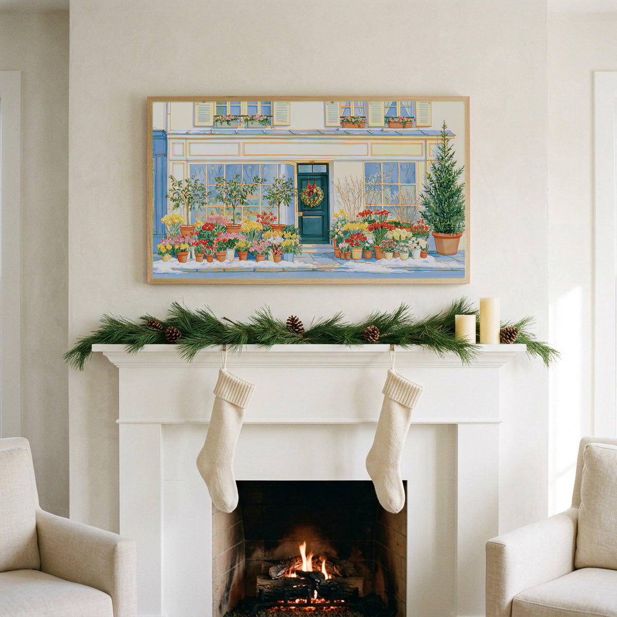Paris flower shop art on a TV above a white fireplace with a pine garland and cream stockings