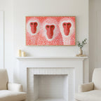 Frame TV art above a white fireplace with candles and eucalyptus on the mantel