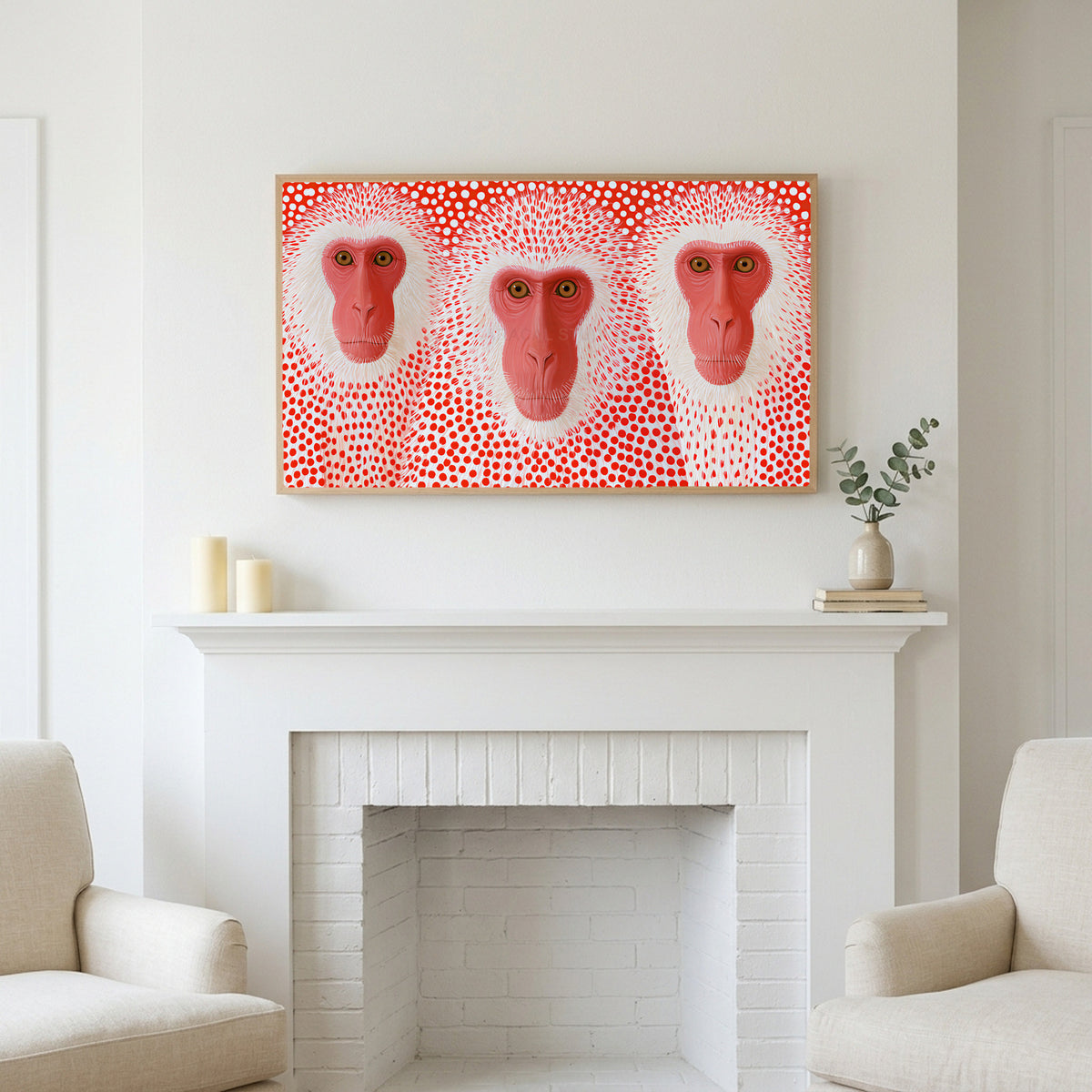 Frame TV art above a white fireplace with candles and eucalyptus on the mantel