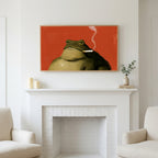 Smoking toad art above a white fireplace with candles and eucalyptus on the mantel