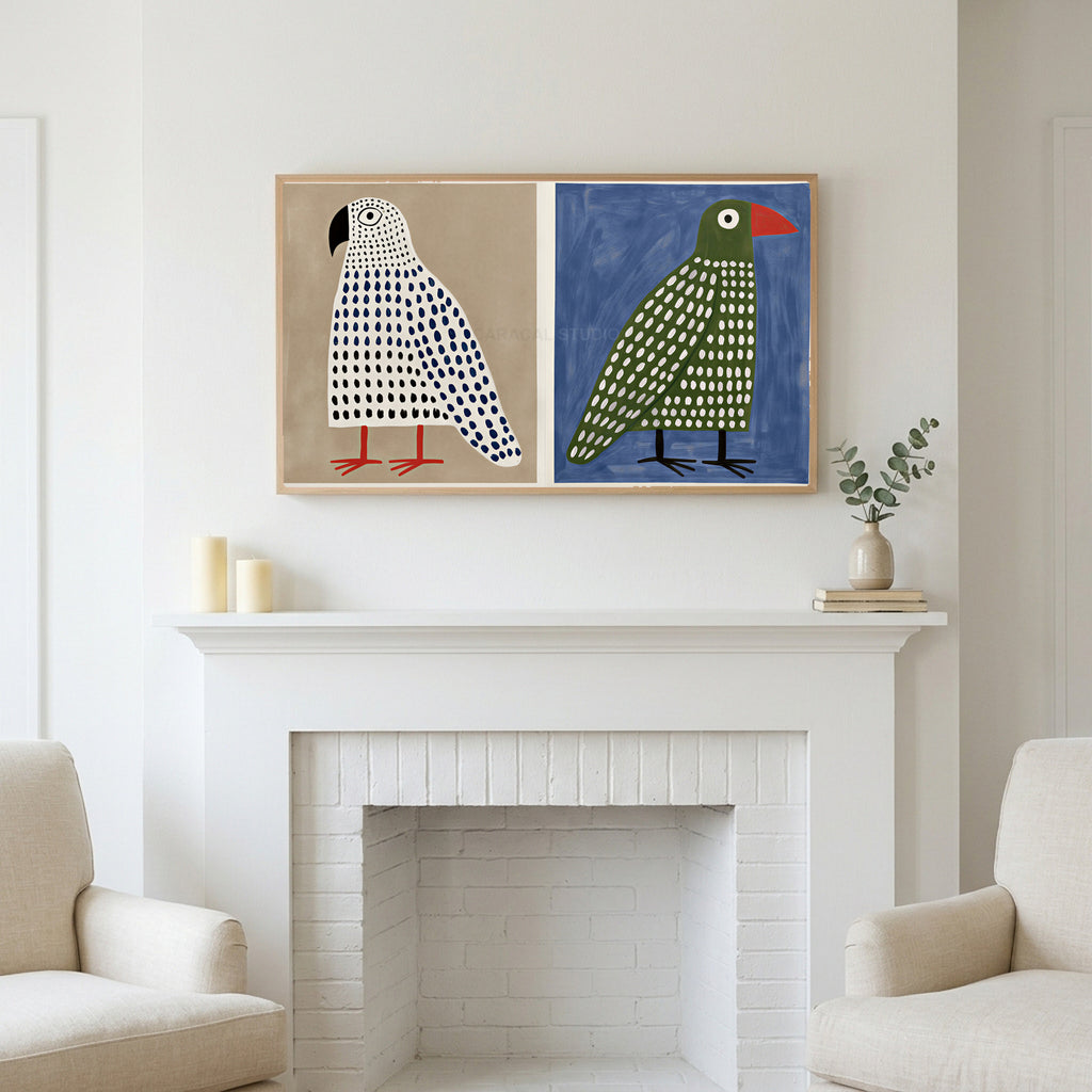 Polka dot birds art above a white fireplace with candles and eucalyptus on the mantel
