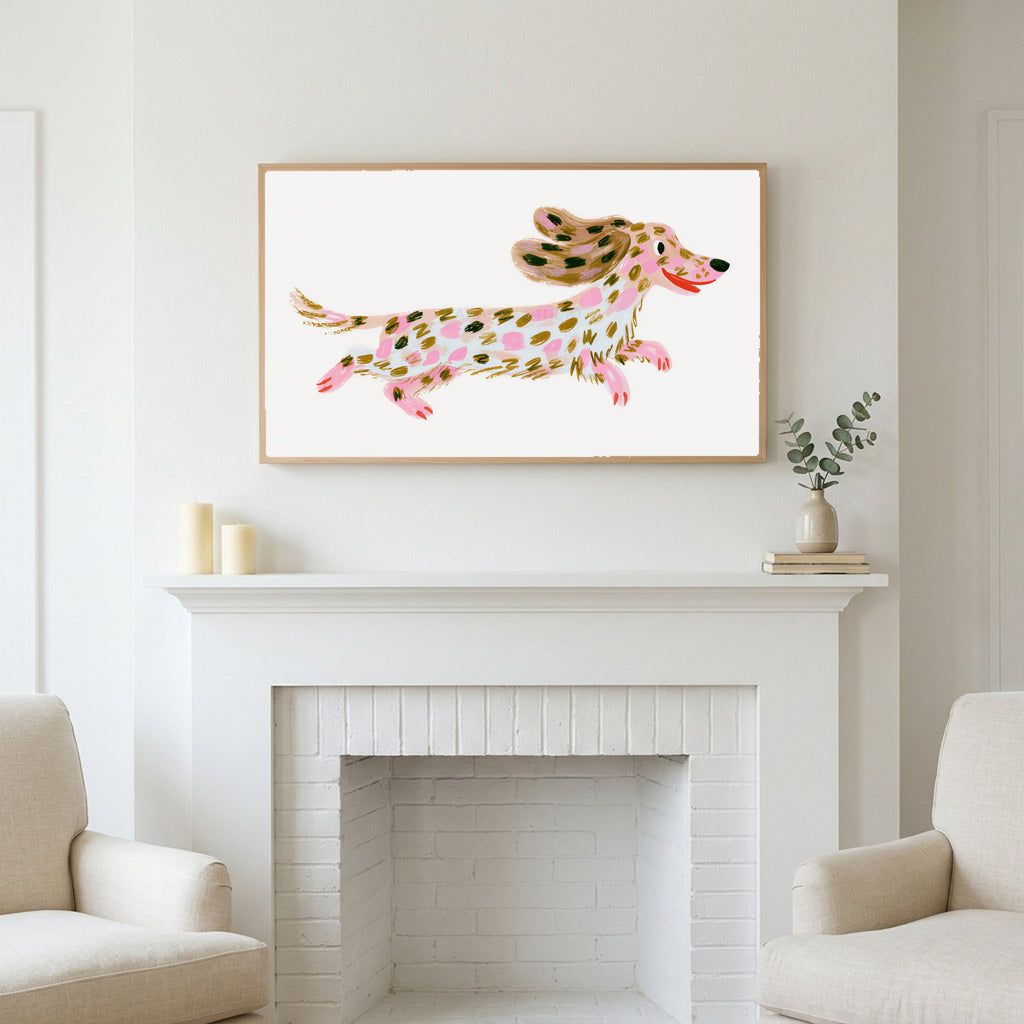 Running dachshund art above a white fireplace with candles and eucalyptus on the mantel