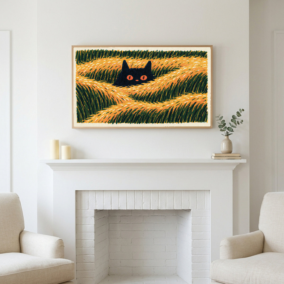 Black cat in grass art above a white fireplace with candles and eucalyptus on the mantel