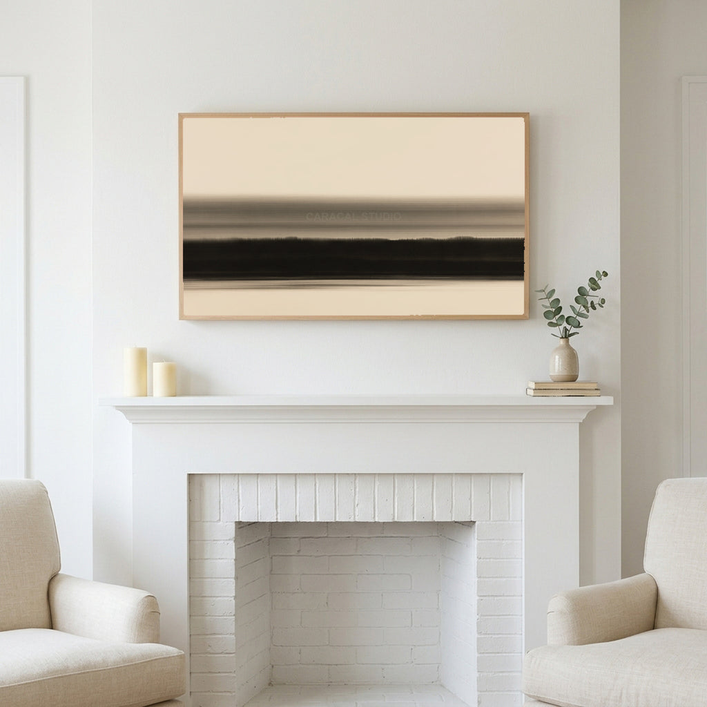 Ink wash horizon art above a white fireplace with candles and eucalyptus on the mantel