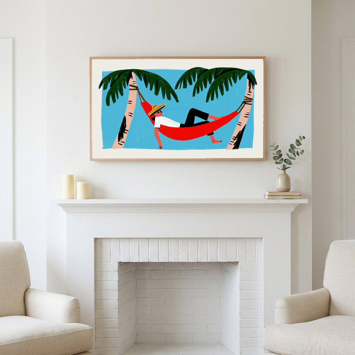 Hammock art above a white fireplace with candles and eucalyptus on the mantel