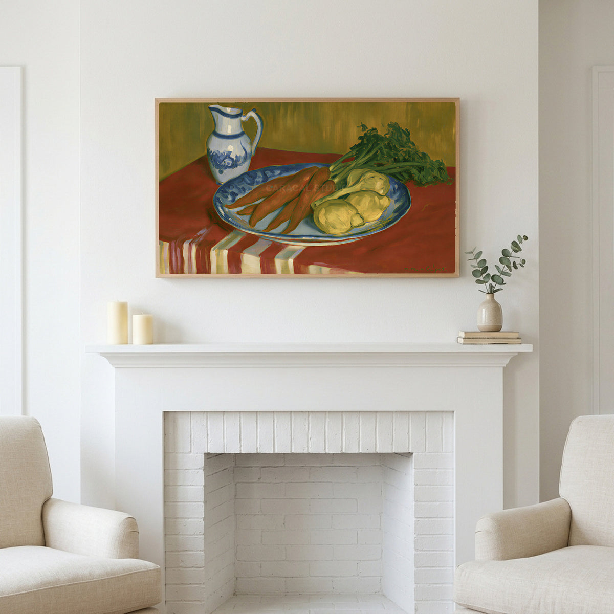 Vintage carrot still life art above a white fireplace with candles and eucalyptus on the mantel
