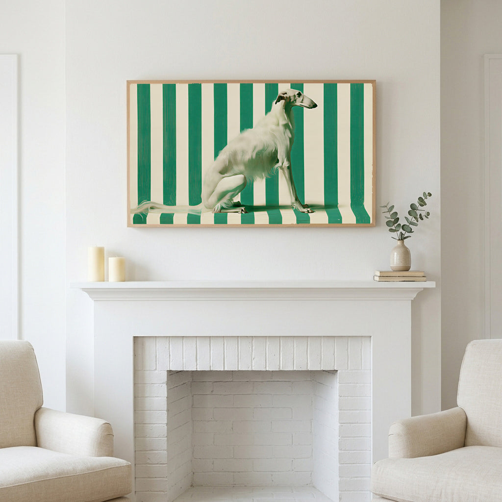 Borzoi art above a white fireplace with candles and eucalyptus on the mantel