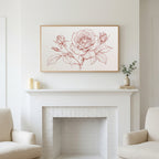 Rose line drawing art above a white fireplace with candles and eucalyptus on the mantel