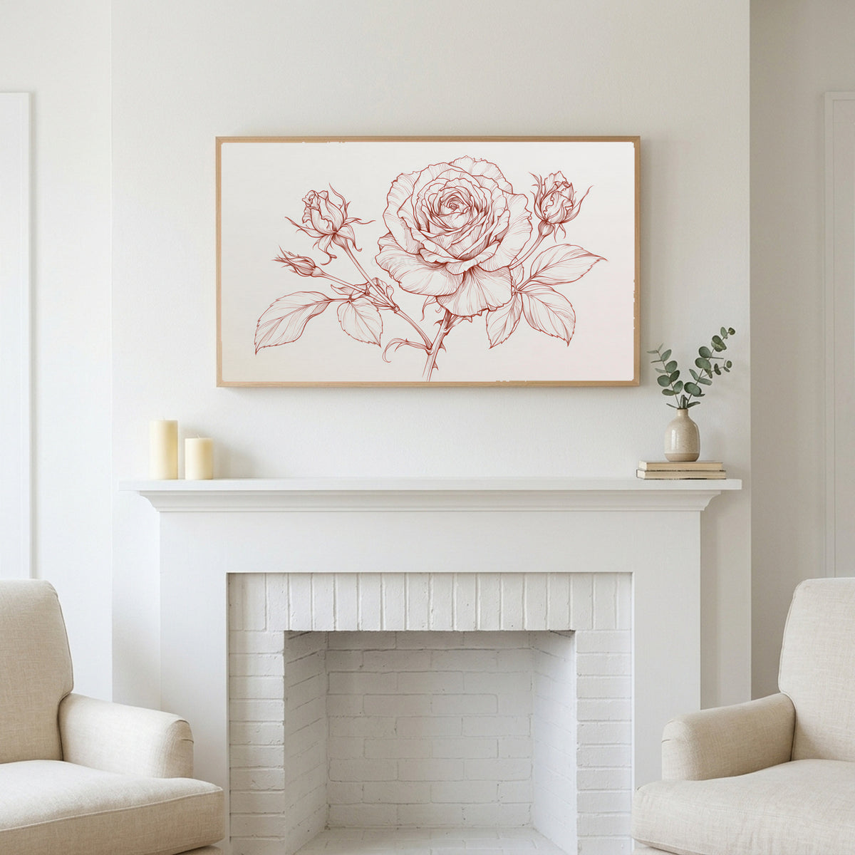 Rose line drawing art above a white fireplace with candles and eucalyptus on the mantel