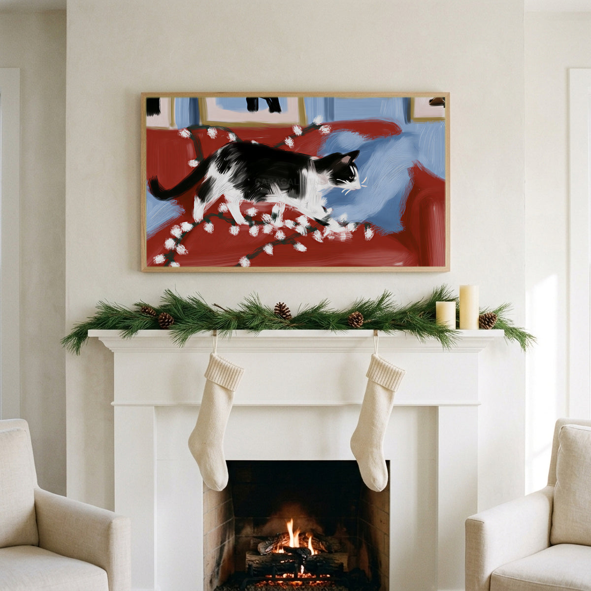 Black and white cat with Christmas lights art on a TV above a white fireplace with a pine garland and cream stockings